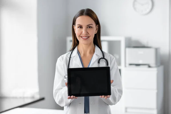 Medicine Healthcare Profession Concept Smiling Female Doctor Stethoscope Showing Tablet — Stockfoto