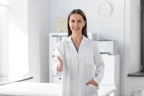 Medicine Healthcare Profession Concept Smiling Female Doctor Giving Her Hand — Stok fotoğraf