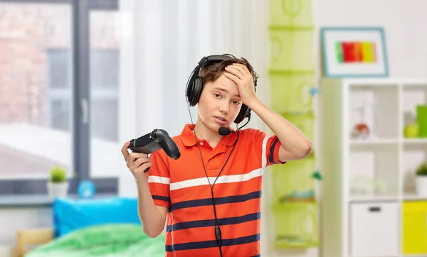 Leisure Technology Children Concept Unhappy Boy Headphones Microphone Gamepad Playing — Fotografia de Stock