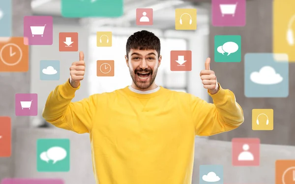 Gesture People Concept Smiling Young Man Yellow Sweatshirt Showing Thumbs — Stockfoto