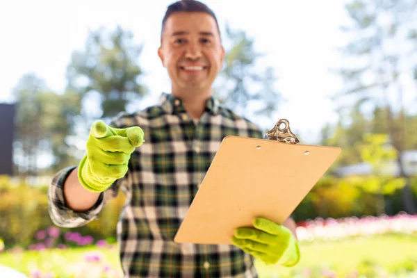 Gardening People Concept Close Happy Smiling Man Clipboard Pointing Finger — Photo