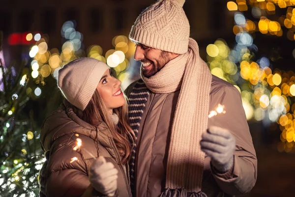 Winter Holidays People Concept Happy Smiling Couple Sparklers Christmas Lights —  Fotos de Stock