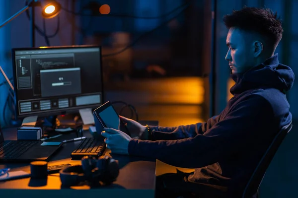 Cybercrime Hacking Technology Concept Male Hacker Dark Room Tablet Using — Foto de Stock