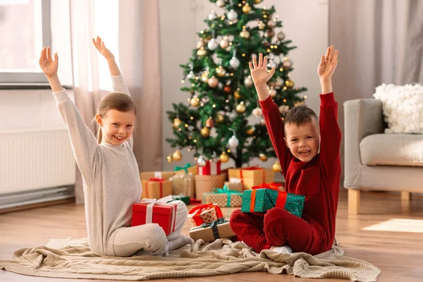 Christmas Winter Holidays Childhood Concept Happy Girl Boy Pajamas Gifts — Zdjęcie stockowe