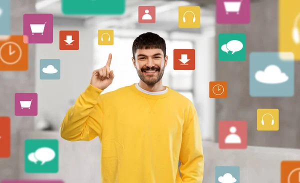 Count People Concept Smiling Young Man Yellow Sweatshirt Showing One — Zdjęcie stockowe