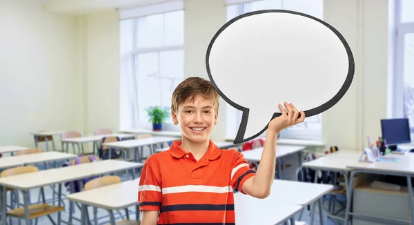 Education School People Concept Smiling Boy Holding Blank Speech Bubble — Stockfoto