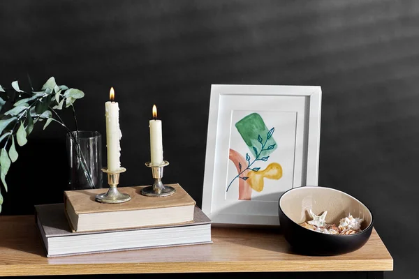Interior Home Decor Concept Bench Burning Candles Picture Frame Books — Stok fotoğraf
