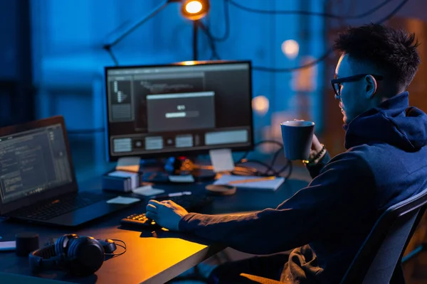 Cybercrime Hacking Technology Concept Male Hacker Dark Room Drinking Coffee - Stock-foto