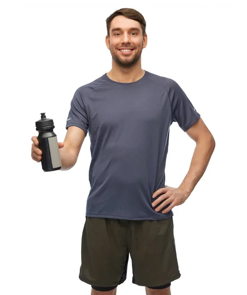 运动和健康的生活方式 身穿白底瓶装运动服 面带微笑的男人 — 图库照片