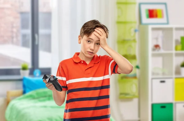 Childhood Gaming Leisure Concept Unhappy Boy Red Polo Shirt Gamepad — Stockfoto