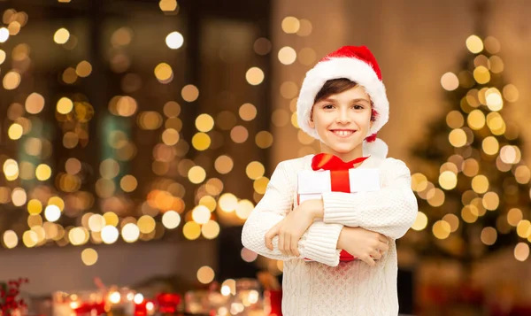 Holidays Christmas Childhood Concept Smiling Happy Boy Santa Hat Gift 图库图片