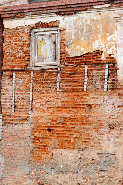 Old gungy wall with immured window — Stock Photo, Image