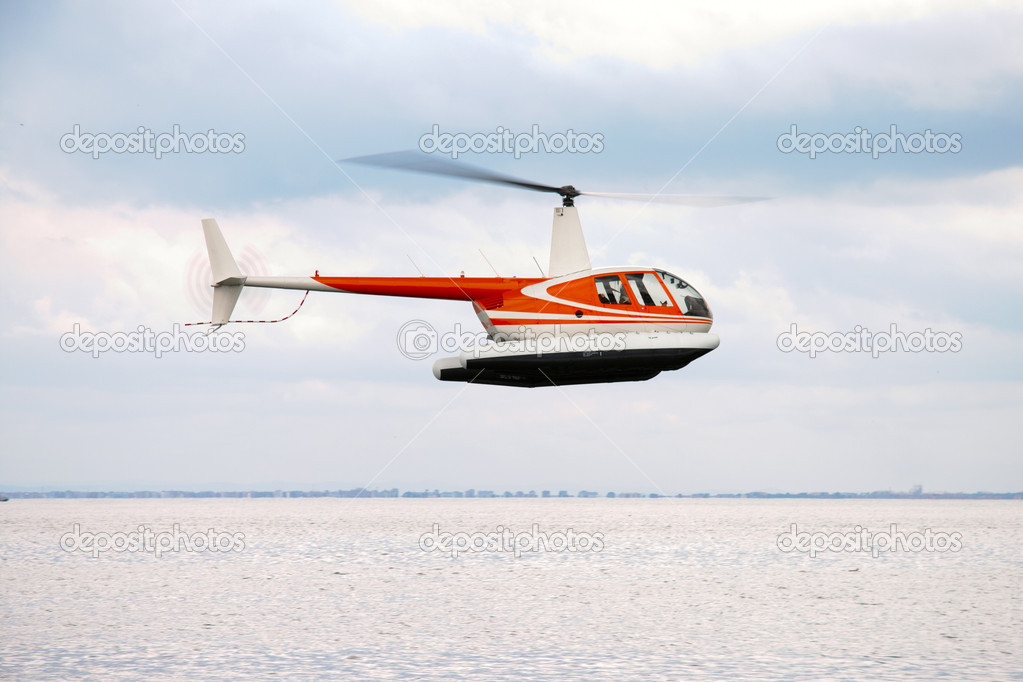 Commercial helicopter flying in the sky