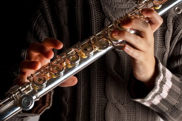 Girl playing flute — Stock Photo, Image