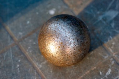 Old ball for Pétanque