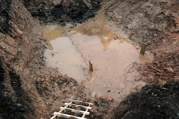 Construction pit filled with water