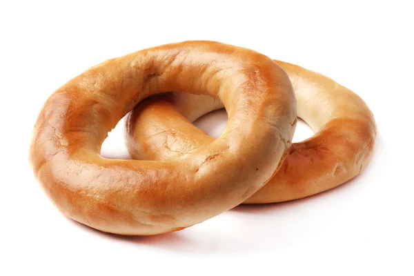 Bagels de trigo inteiro isolado em branco — Fotografia de Stock