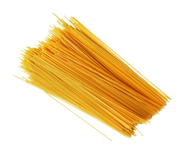 Uncooked Italian spaghetti on a white. — Stock Photo, Image