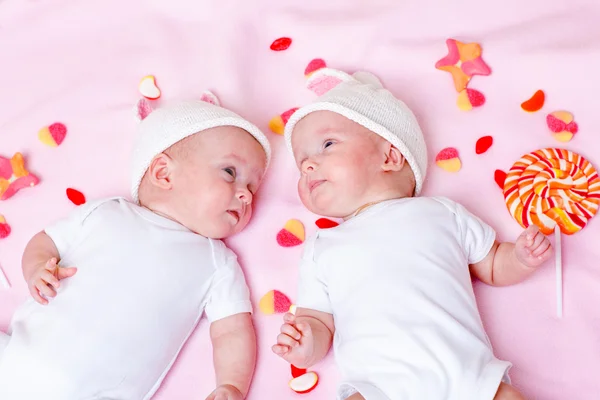 Twins and sweets — Stock Photo, Image