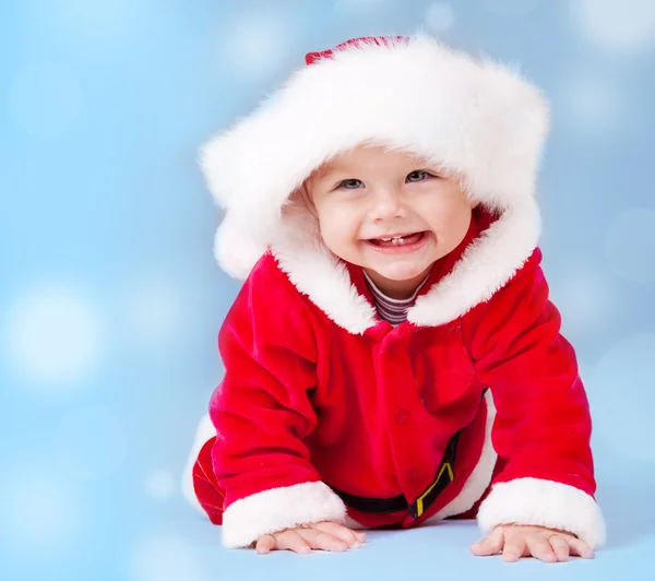 Süßes Baby im Weihnachtsmannkostüm — Stockfoto