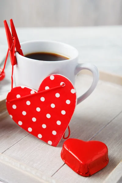 Dulce pequeño corazón y taza de café — Foto de Stock