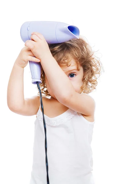 Girl with a hair dryer — Stock Photo, Image