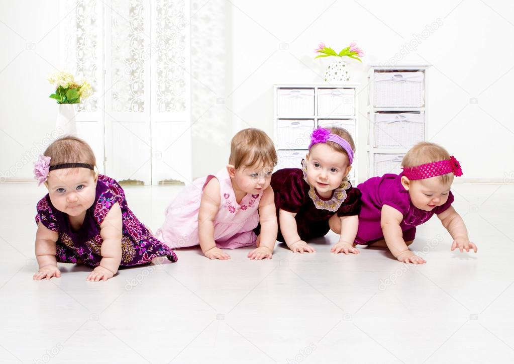 Toddler girls crawling