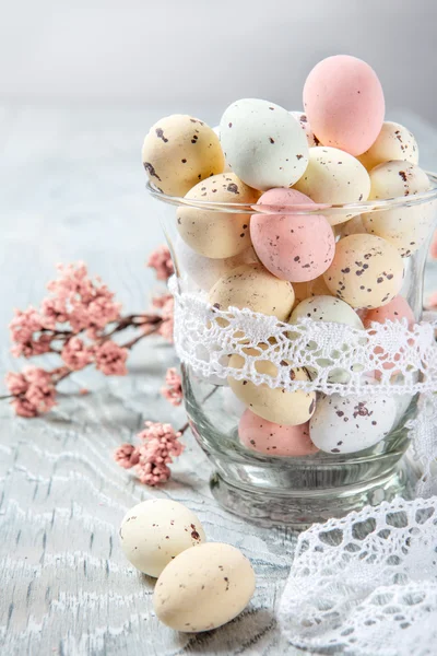 Easter eggs and spring cherry tree branch — Stock Photo, Image