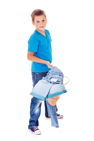 Niño con pila de ropa —  Fotos de Stock