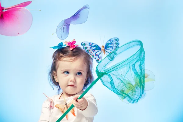 Niño pescando mariposas — Foto de Stock