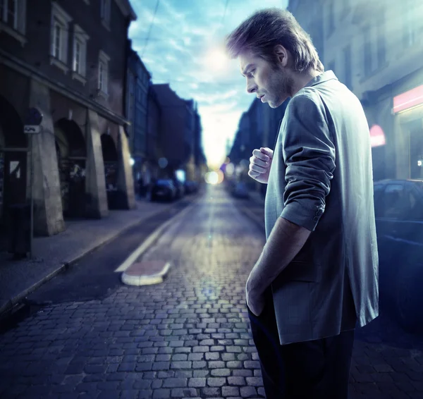 Thoughtful handsome man in downtown — Stock Photo, Image