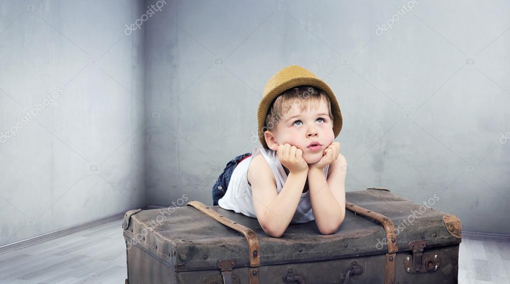 Little boy dreaming about toys — Stock Photo © konradbak 31836007