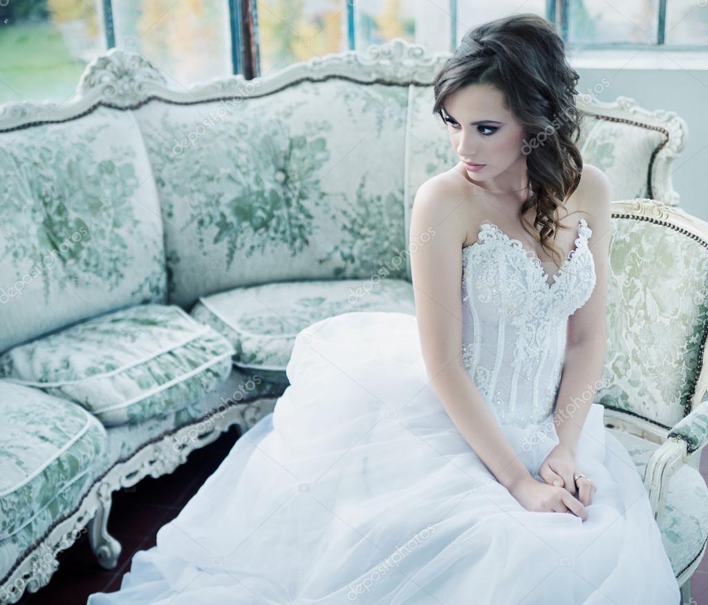 Sensual young bride after wedding reception — Stock Photo © konradbak ...