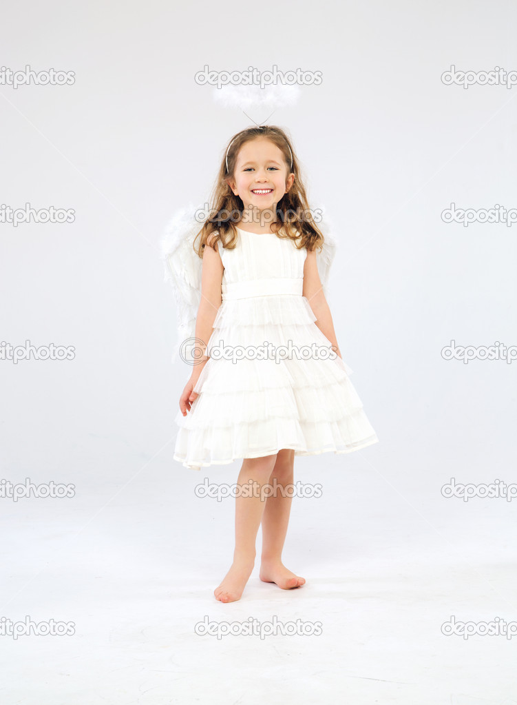 Cute little girl as an angel