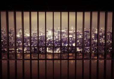 Night city behind the grating clipart