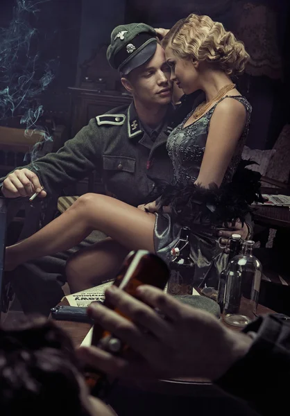 Portrait of the sensual military german couple — Stock Photo, Image