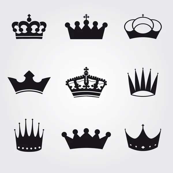 Monochrome vintage antique crowns - icons and silhouettes — Stock Vector