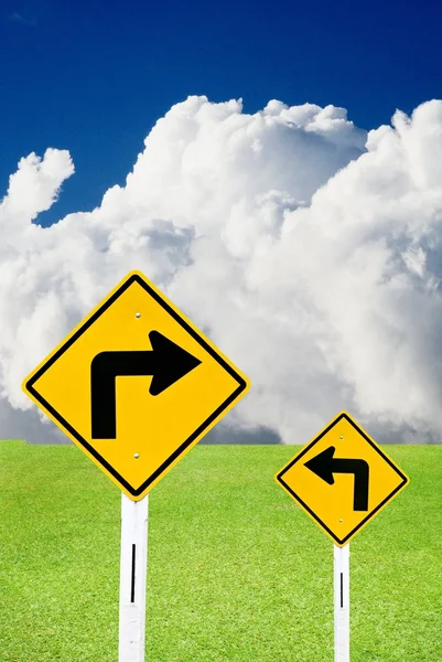 Turn right sign with cloudy sky and nice meadows — Stock Photo, Image