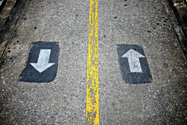 Two way sign on concrete walkway — Stock Photo, Image