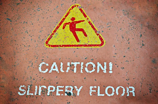 Óvatosan a csúszós padlón — Stock Fotó