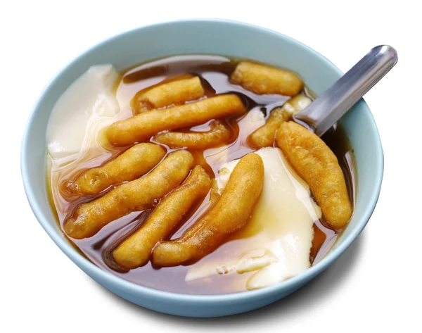Fasola junket jeść gorące z gingered sirup — Zdjęcie stockowe