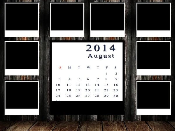 Kalender 2014 Set mit Fotorahmen an Grunge-Wand — Stockfoto