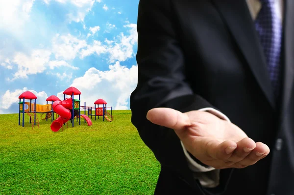 Businessman offer Children's playground project — Stock Photo, Image