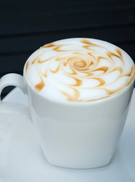 Hot coffee on table in cafe — Stock Photo, Image