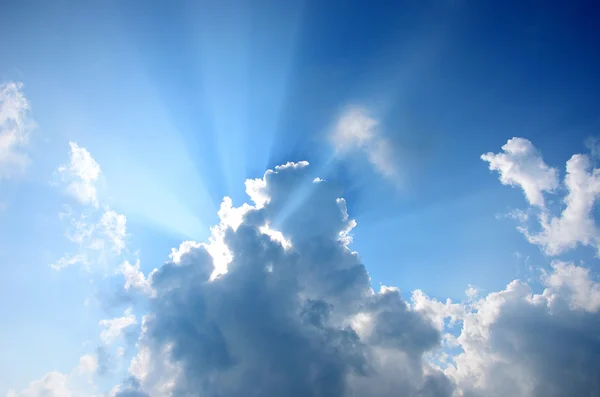 Nice sun beam shining through clouds — Stock Photo, Image
