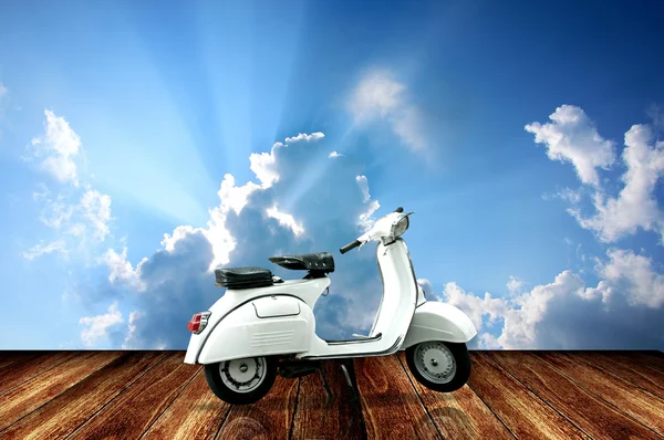 Vintage motorcycle with sky background — Stock Photo, Image