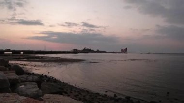 Time lapse of day to night sky with island and sea background