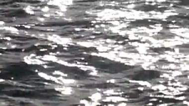 Dalga ve güneş ışığı yansıtır, soyut doğa arka planı