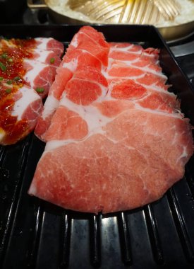 Raw meat for BBQ in black tray, Fresh food for grill