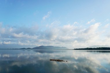 Reflection at lake, Nice water surface reflected landscape and sky background
